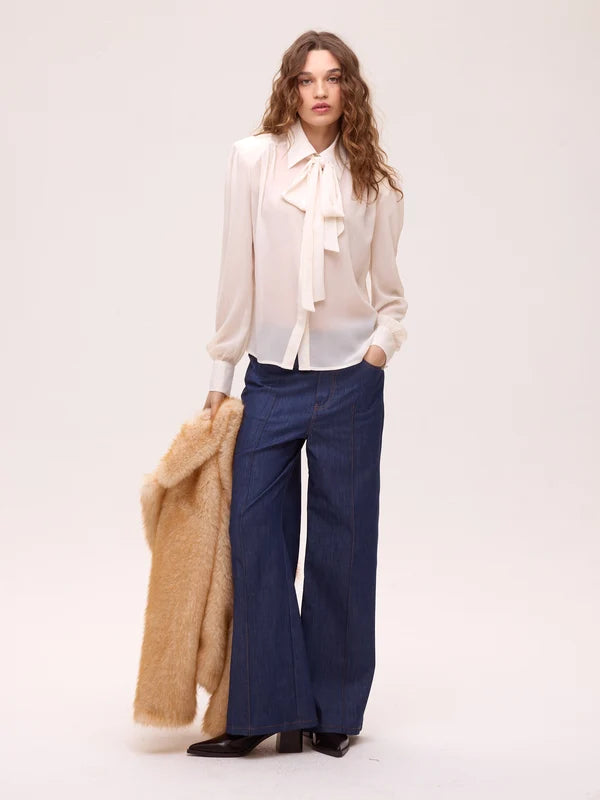 Allure camisa blanca.