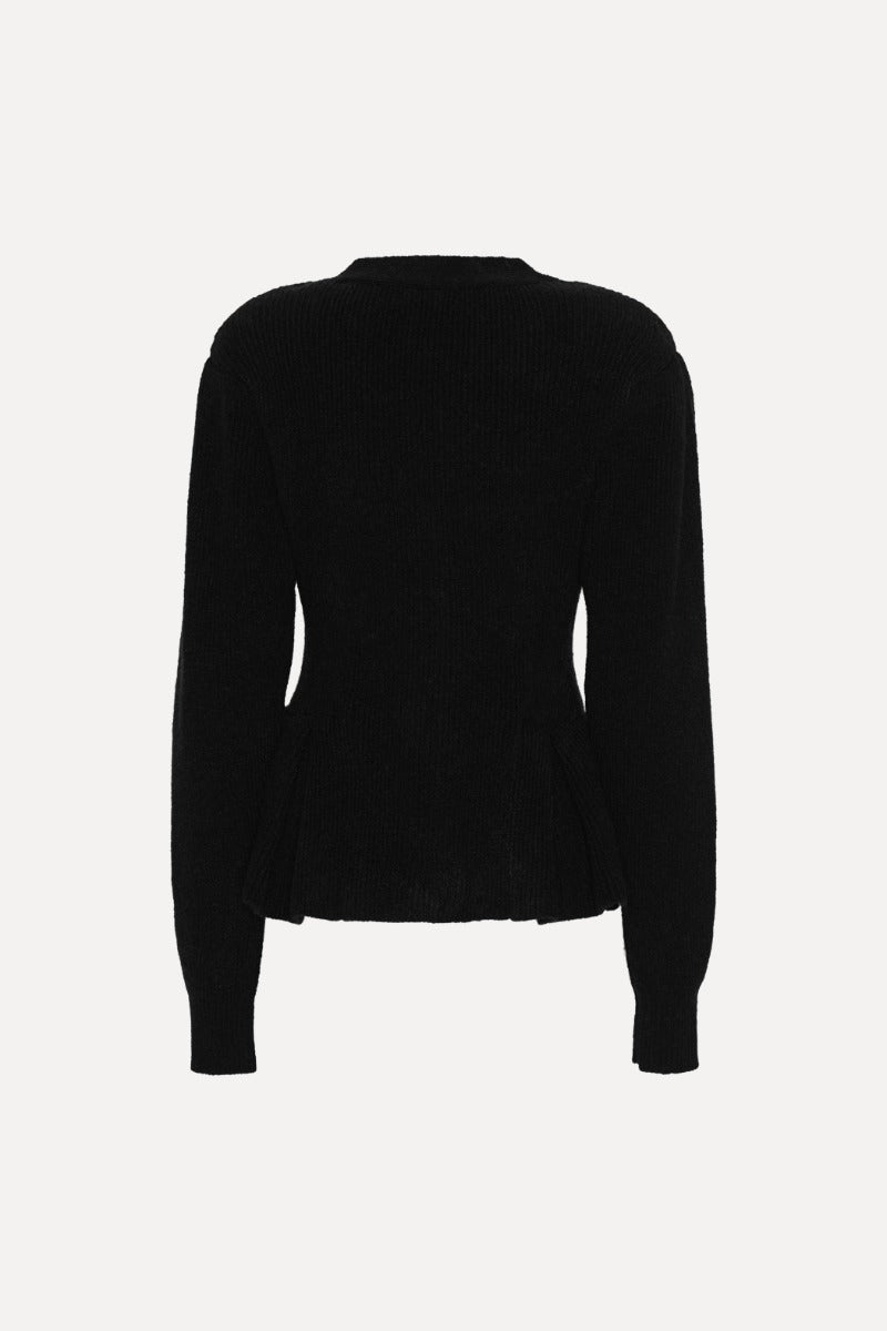 Knit peplum Cardigan.