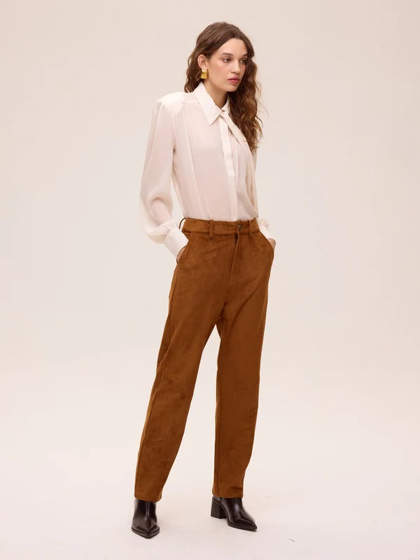 Allure camisa blanca.