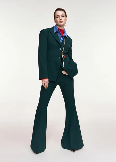 Konsiderate Trumpet Pants verdes.