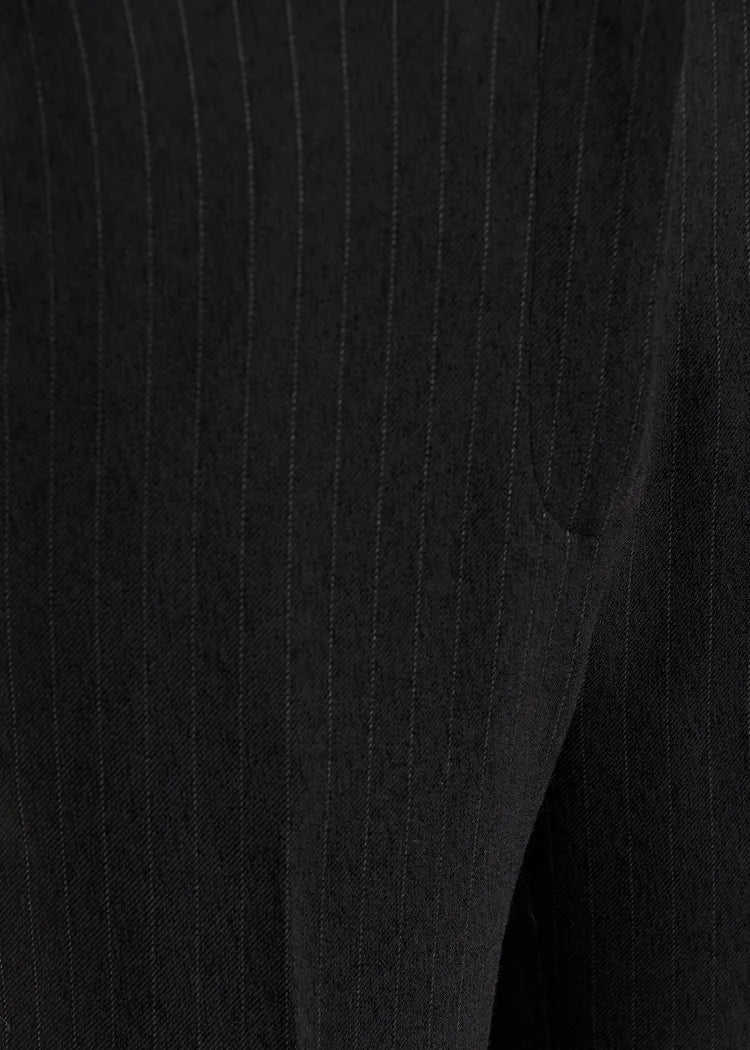 Invade pantalón campana