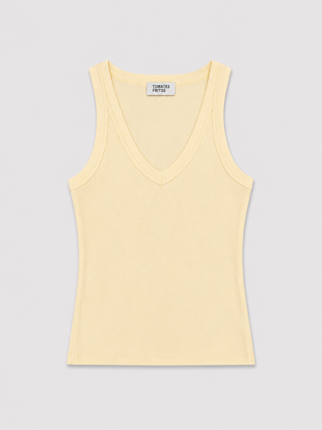 Camiseta Canalé Pico Amarilla— Ajustada Elástica Manga Sisa.