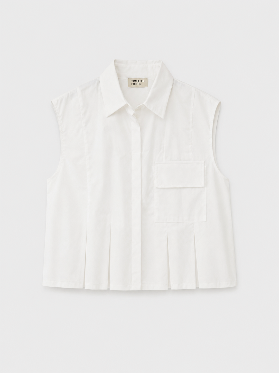 Camisa pliegues blanca.